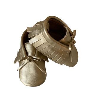 Old Navy gold baby moccasins, size 1